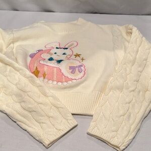 Off white/cream color sweater with colorful bunny on front. So cute!